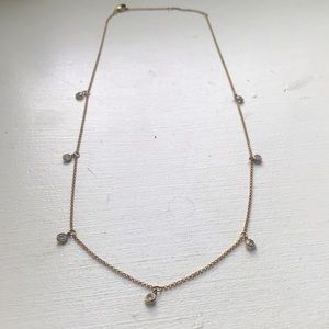 Gold dangly jeweled necklace